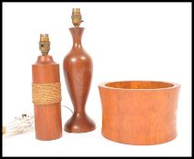 Richard Nissen - A Danish solid teak wood waisted bowl along with two Danish teak lamps with brass