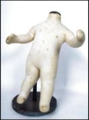 An unusual 20th century  Industrial shop haberdashery child's - baby mannequin. The body in white