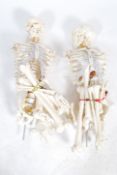 A pair 20th century full size resin / composite doctors hospital medical study skeleton of the human