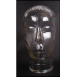 A 20th century moulded pressed glass phrenology type head - shop display stand / millinery mannequin