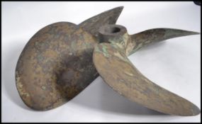 A vintage early 20th century nautical ships bronze three blade propeller. 59cm diameter