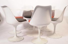 An original mid century large original Knoll international designed by Eero Saarinen tulip dining