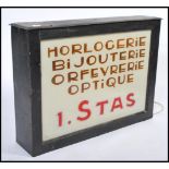 A rare 1930's large French double sided tin and glass light box / light up shop sign. The white