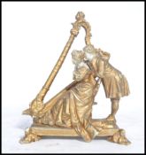 A 19th century parian ware gilded figure group of