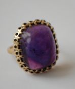 A 1950's hallmarked 9ct gold and amethyst ring set