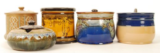 A group of Doulton tobacco jars to include Dickens