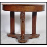 A Victorian mahogany Duchess console table being r