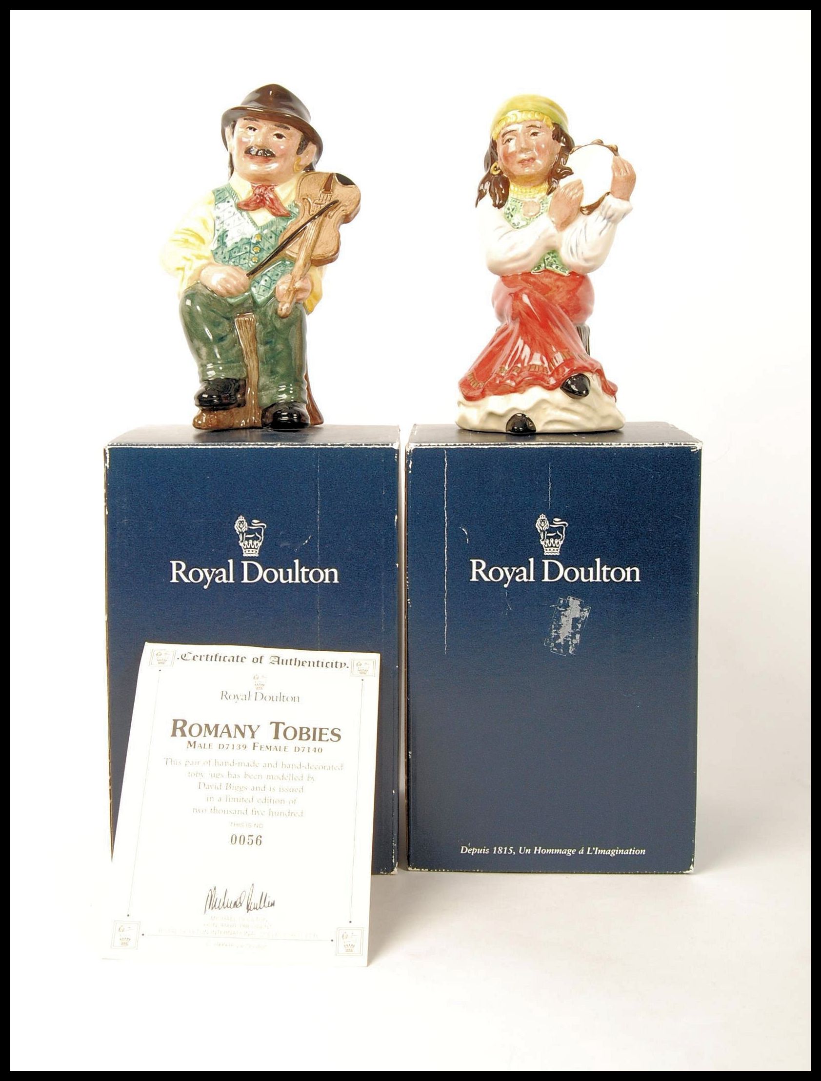 A pair of Royal Doulton Toby jugs Romany Male D7139 and Romany Female D7140, limited edition in