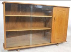 A mid century oak display cabinet bookcase room di
