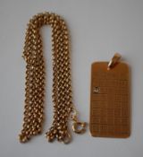 A hallmarked 9ct gold chain and pendant set with a