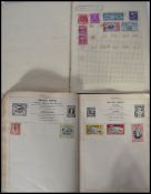 Two vintage stamp albums containing World stamps d