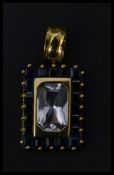 An 18ct gold sapphire and topaz necklace pendant h