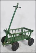 A vintage 20th century painted dog cart constructe