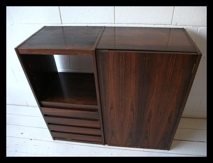 A 1970's retro teak wood veneer wall cabinet being