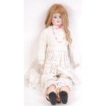 ANTIQUE GERMAN 19TH CENTURY BISQUE HEADED DOLL