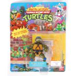 TEENAGE MUTANT NINJA TURTLES CARDED ACTION FIGURE