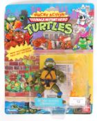 TEENAGE MUTANT NINJA TURTLES CARDED ACTION FIGURE