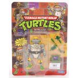 TEENAGE MUTANT NINJA TURTLES CARDED ACTION FIGURE