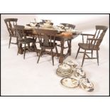 A good oak miniature refectory dining table together with a set of 6 oak Windsor dining chairs