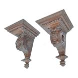 A pair of 19th century large solid walnut carved w