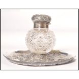 A 19th century Victorian silver hallmarked large inkwell and stand of rococo influence. Hallmarked