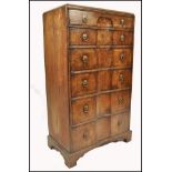 A good Queen Anne 19th century walnut concave fronted chest of drawers. The chest with pierced brass