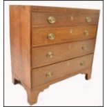 A 19th century Georgian mahogany inlaid bachelors chest of drawers. Raised on bracket feet with a