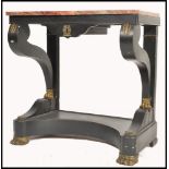 A 19th century French empire rouge marble top console hall table. The ebonised mahogany base with