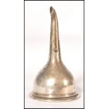 A 19th century silver plated ( on copper ) wine funnel having a tapering stem with bowl and