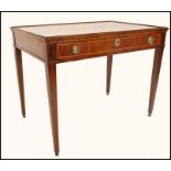 A late 18th century Italian mahogany and marquetry inlaid writing table desk. The desk with stub