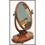 A  good large Victorian 19th century ladies large dressing table jewellery mirror being raised on