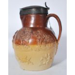 An early 19th century London Salt Glazed Stoneware ewer jug by Vauxhall pottery. The two tone jug of