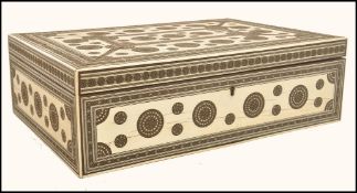 A 19th century Vizagapatam Indian work box having ivory microcosmic box with circular medallions and