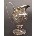 An 18th century George 3rd silver ewer / jug by maker Paul Storr, London, 1793. The ewer raised on