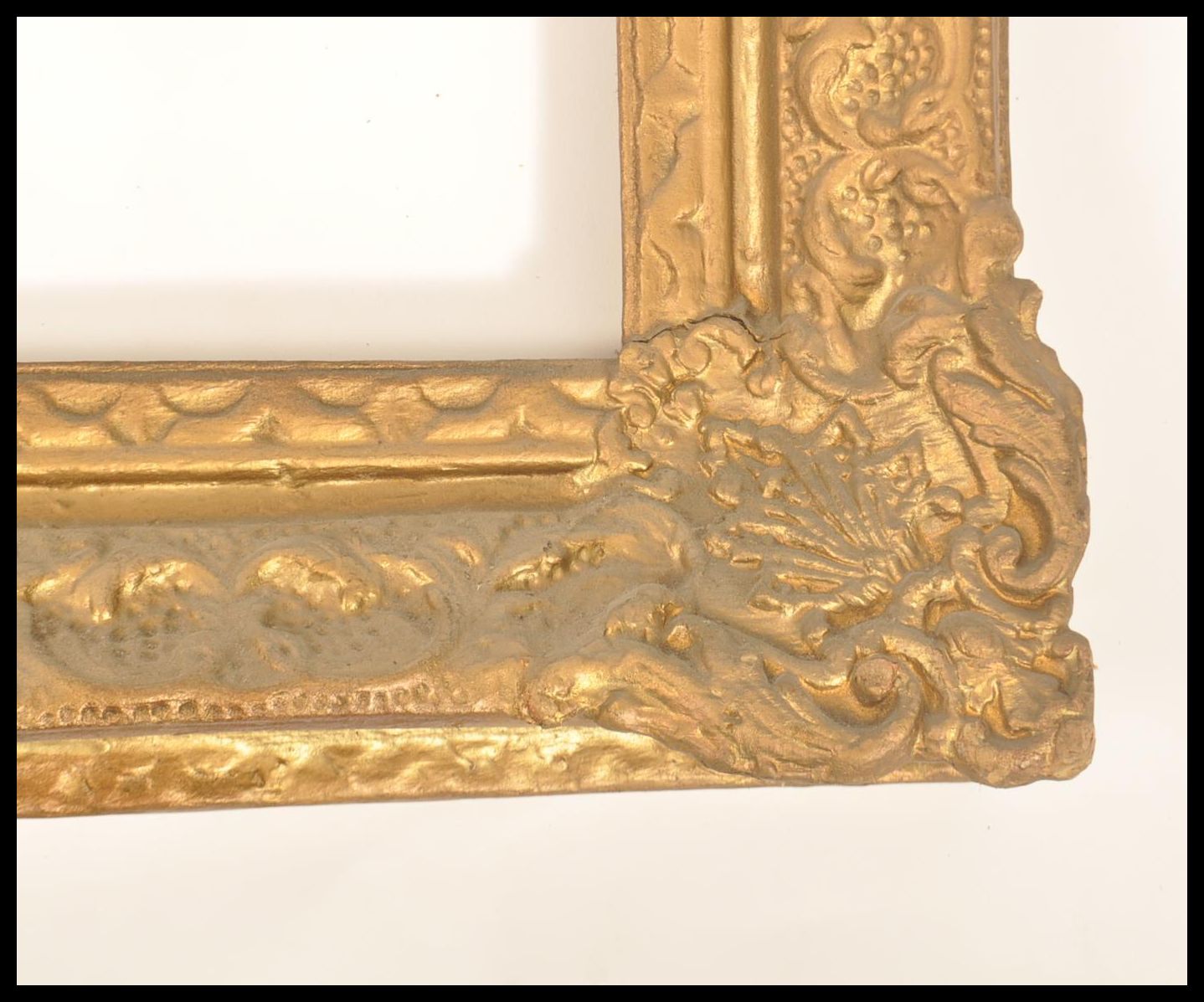 A 19th century good papier mache gilded rococo mirror - picture frame. Of angled cushion form with - Image 3 of 6