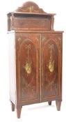 A 19th century painted mahogany chiffonier side cabinet being raised on sqaure tapering legs with
