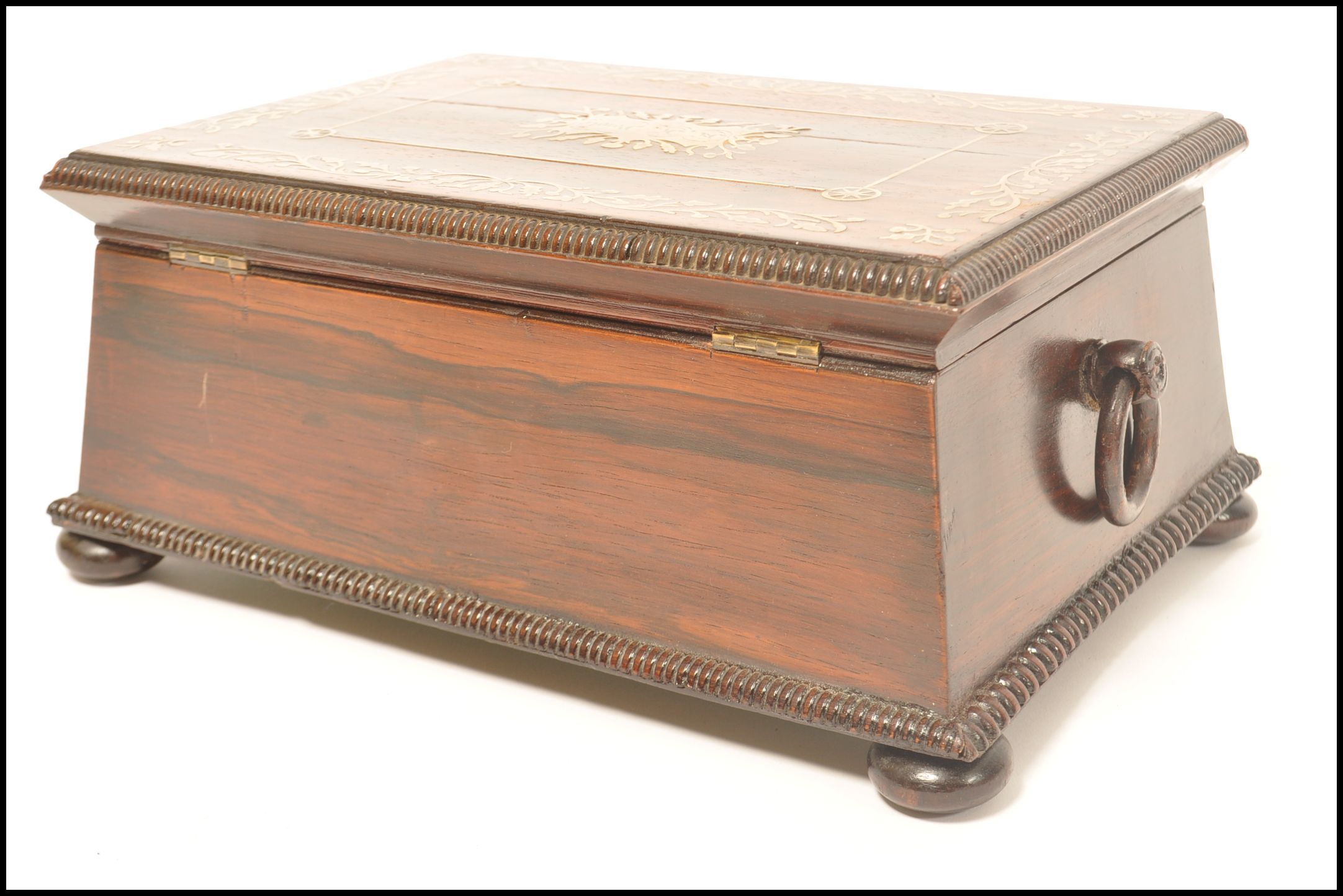 A Regency rosewood brass inlaid work box raised on bun feet with gadrooned edges. Loop handles to - Image 7 of 10