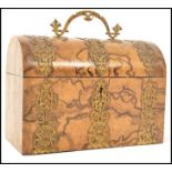 A 19th century walnut dome topped stationary box having brass bounding with shaped brass drop handle