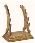 A 18th century Georgian French Boulle work pen rest / rack raised on a pedestal base with two shaped