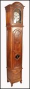 A 19th century large french fruitwood comptoise longcase clock - grandfather clock. Of tall