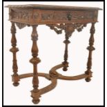 A good 19th century Italian Renaissance walnut console table, boldly carved with a turned reeded