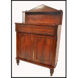 A fine 19th century Regency mahogany chiffonier sideboard. Raised on shaped supports with twin