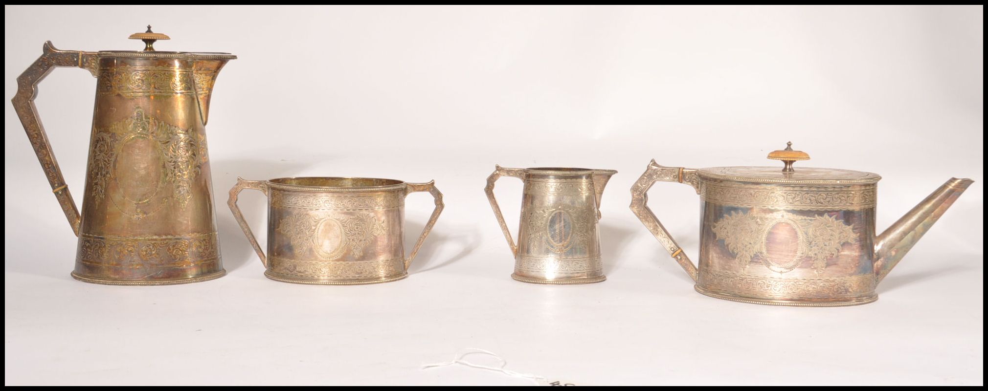 An Elkington & Co 4 piece silver plated tea service being chased with wreath and central plain - Image 3 of 10