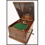 An early 20th century mahogany cased HMV / His Masters Voice table top gramophone, the hinged lid