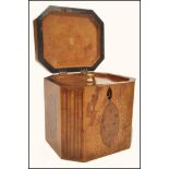 An 18th century Georgian walnut tea caddy having yew wood oval panels and box wood inlays. The