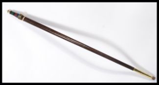 A vintage 20th century walking stick cane having a