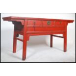 A 20th century large Chinese red lacquered sideboa