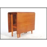 A mid century Avalon teak wood drop leaf dining ta