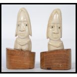 A pair of 19th century West African ivory fertilit