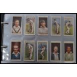 An album of vintage cigarette cards , mainly compl